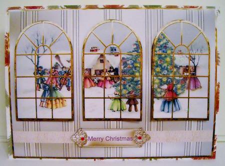 Carol Singers Around the Christmas Tree Window View by Pam Stubley