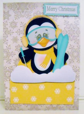 Snowboarding Penguin with Orange Mask Over the Edge by Pam Stubley