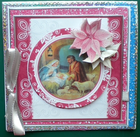 Nativity scene and poinsettia by Pamela Horton