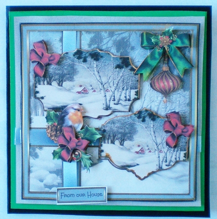 Robin, bauble and village by Pamela Horton