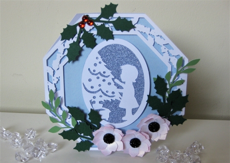 Decorating the tree octagonal Christmas card by Pat Mottram