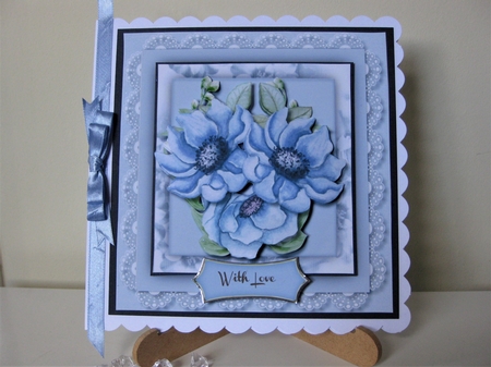 Beautiful Blue Flowers on vintage Lace  by Pat Mottram
