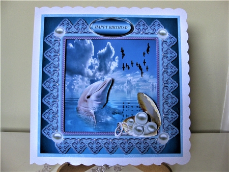 dolphin and pearls by Pat Mottram