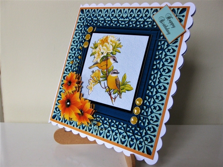 Yellow Birds On A Flower by Pat Mottram