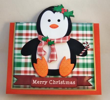Penguin with Holly by Patricia Platt