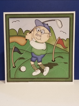 Old Man Bert plays Golf Fan Pyramage Topper by Patty Stone