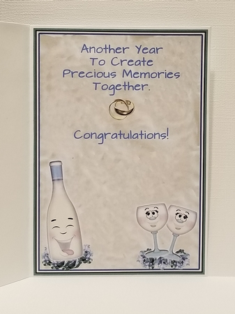Happy Anniversary to THE HAPPY COUPLE with blue roses & toony champagne by Patty Stone