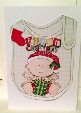 Baby Boys 1st Christmas with His Stocking on a Bib by pauline inglis