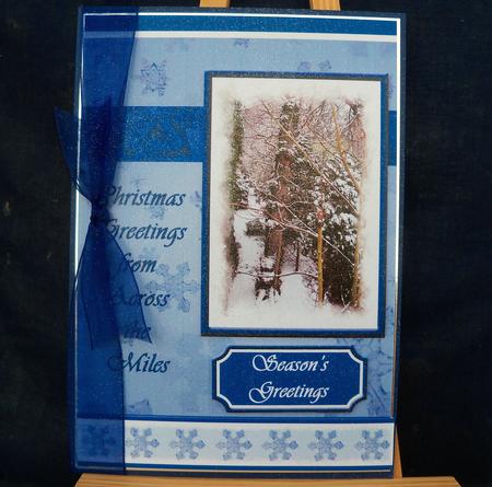 Christmas Greetings from Across the Miles (blue) - A5 by Pauline Worthington