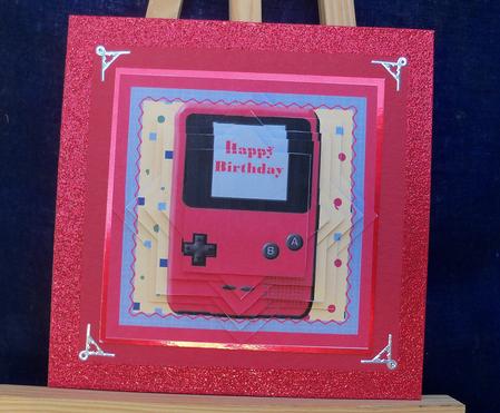 Red Gameboy Star Pyramid by Pauline Worthington