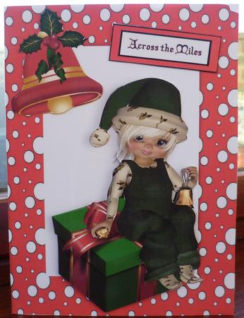 Across the Miles, Little Christmas Kiki Girl with Present by Pearl North
