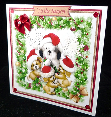  cute puppies galore! in santa hats in festive frame 8x8 by Peggy Stogdill