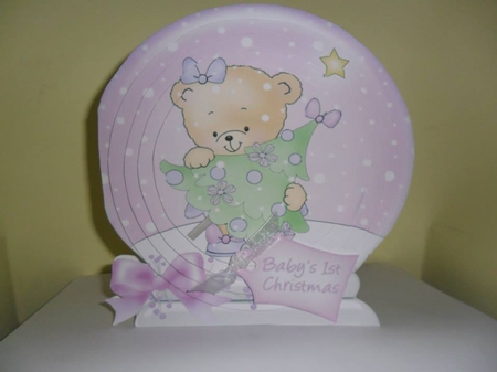 Baby Girl's 1st Christmas Snow Globe by Nicola Busuttil