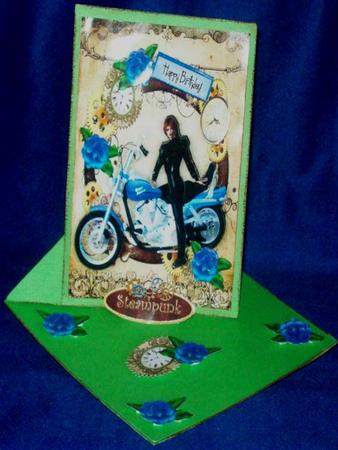 Harley Biker Babe in Steampunk Frame with Blue Flowers A4 by Rayleen Bailey
