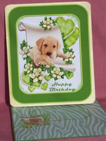 Golden Labrador Puppy on a Scroll of Hearts and Flowers A4 by Rayleen Bailey