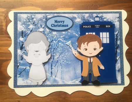 Dr Who With tardis and weeping angel in the winter by Rebecca Ruff