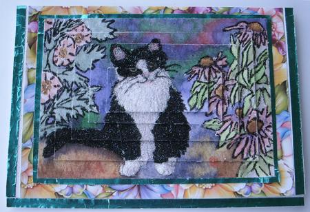Black & White Tuxedo Cat in the Garden Pyramage by Redonda Haddock