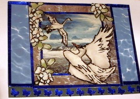 Beautiful Swans with the Blue Ocean & Flowers 8x8 by Redonda Haddock
