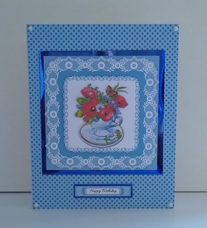 Lovely Poppies In A Teacup (Blue) by Roseanna Miles