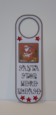 jj christmas santa in chimney door hanger by Roseanna Miles