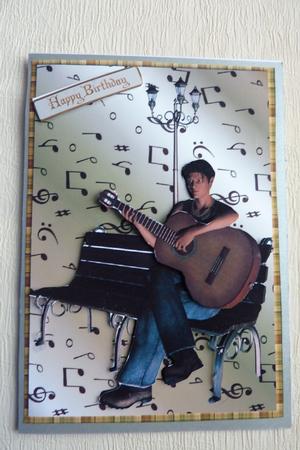 Guitar Player with Decoupage by Rosina Walker