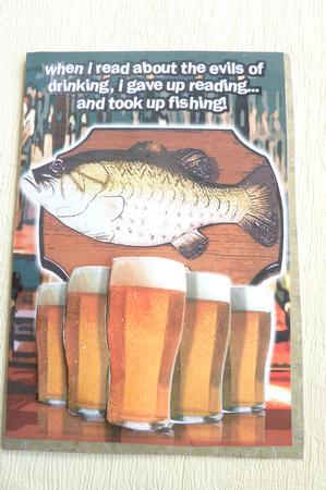 Pints of Beer on Pub Bar with a Fish on a Plaque by Rosina Walker