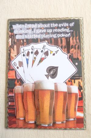 Pints of Beer on Pub Bar with Poker Cards by Rosina Walker