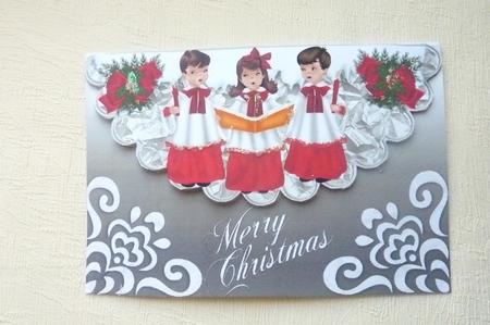 Carol Singers with Snow on a Scalloped Envelope A4 by Rosina Walker