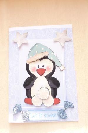 Cute Penguin with Blue Hat in Blue Lace Frame by Rosina Walker