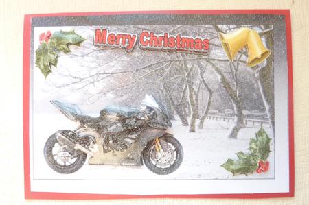 Black Motorbike on Snowy Scene Background by Rosina Walker