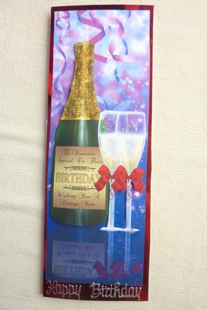 Wine Bottle and Glasses Birthday Card Front by Rosina Walker