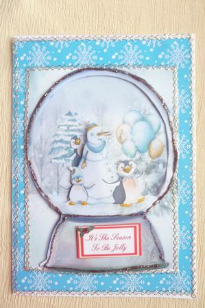 Penguins Snow Globe by Rosina Walker