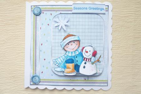 Dressing the Snowman by Rosina Walker