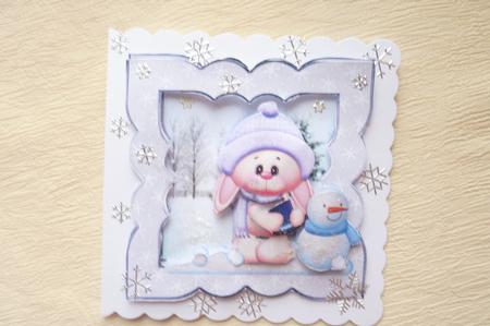 Snow Bunny with a Snowman by Rosina Walker