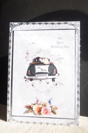 Bride and Groom in Open Top Car by Rosina Walker