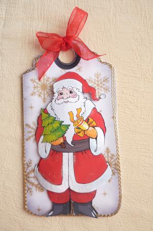 Jolly Santa with Bells on Gold Snowflake Tag by Rosina Walker