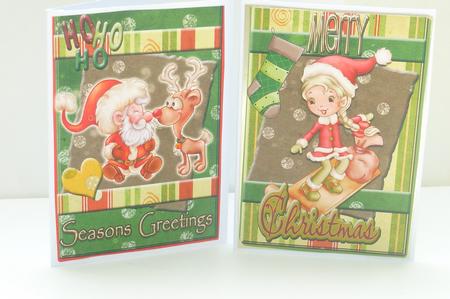 4 Christmas Toppers-santa, Helper and Reindeer by Rosina Walker