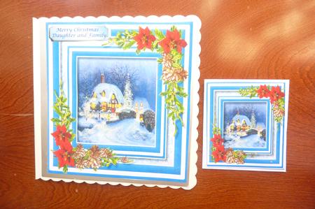 Beautiful Christmas Scene with Pine Cones and Poinsettias  by Rosina Walker
