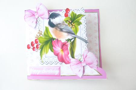 Pretty Bird with Flowers and Pink Bow Over the Edge by Rosina Walker
