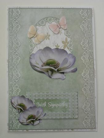White Anemone on Pale Green Lace by Ruth Walters