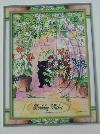 Cat Playing in the Flowers by Ruth Walters