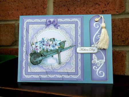 Flower Filled Wheelbarrow Quick Card Wavy Corner Side Stacke by Sally Hickling