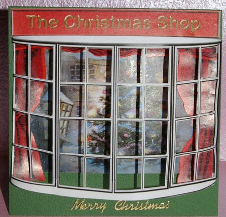3D Christmas Tree in the Christmas Shop Window by Ann Cunningham