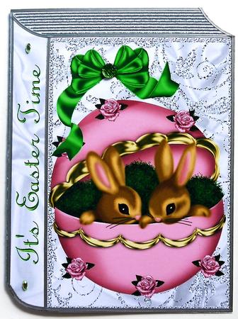 Cute Little Bunnies in Easter Egg on Folded Book by Selina Dittmann