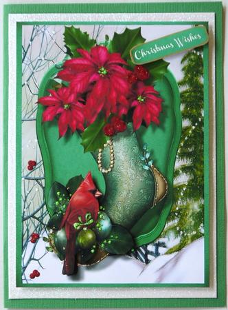 Beautiful Cardinal and Poinsettias on a Christmas Stocking by Selina Dittmann
