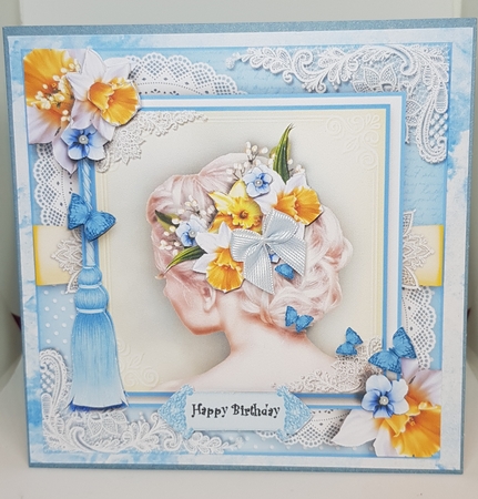 Spring flowers in her hair by Sharon Frost