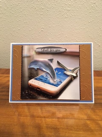 dolphin and phone  by Sharon Hinckley
