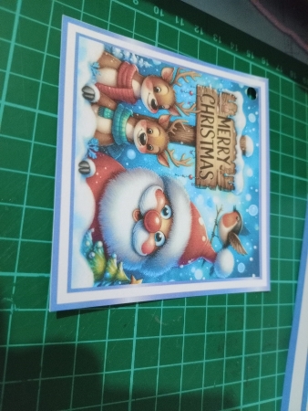 blue christmas reindeer and santa by Sharon Stinson
