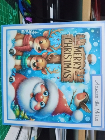 blue christmas reindeer and santa by Sharon Stinson