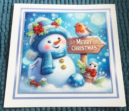 blue christmas snowman 2 by Sharron Hylton